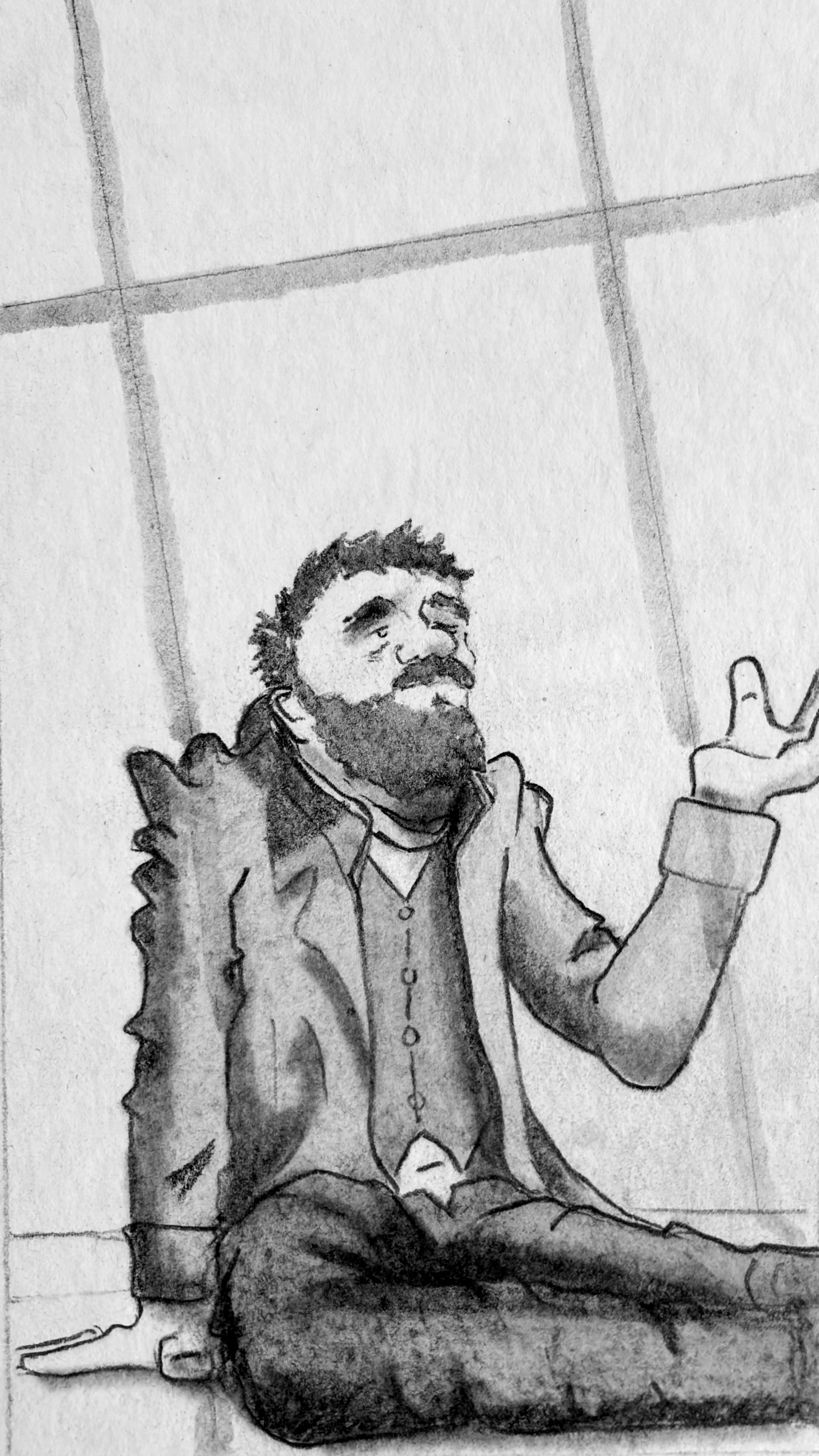 A mid-shot of Glyn sitting on the floor. He looks up, his left hand raised into the air in protest.