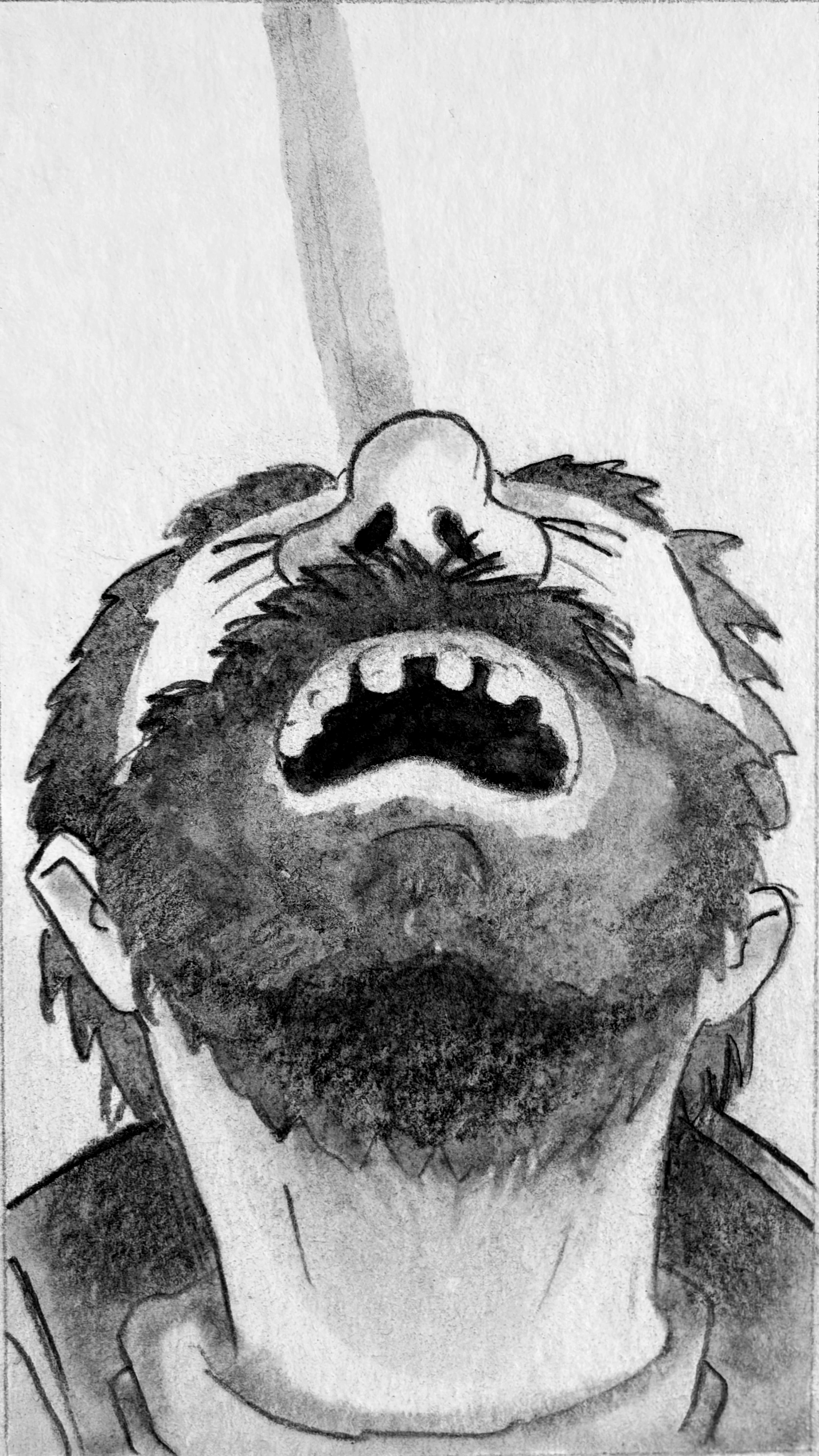 An extreme close up of Glyn, looking up into the sky screaming.