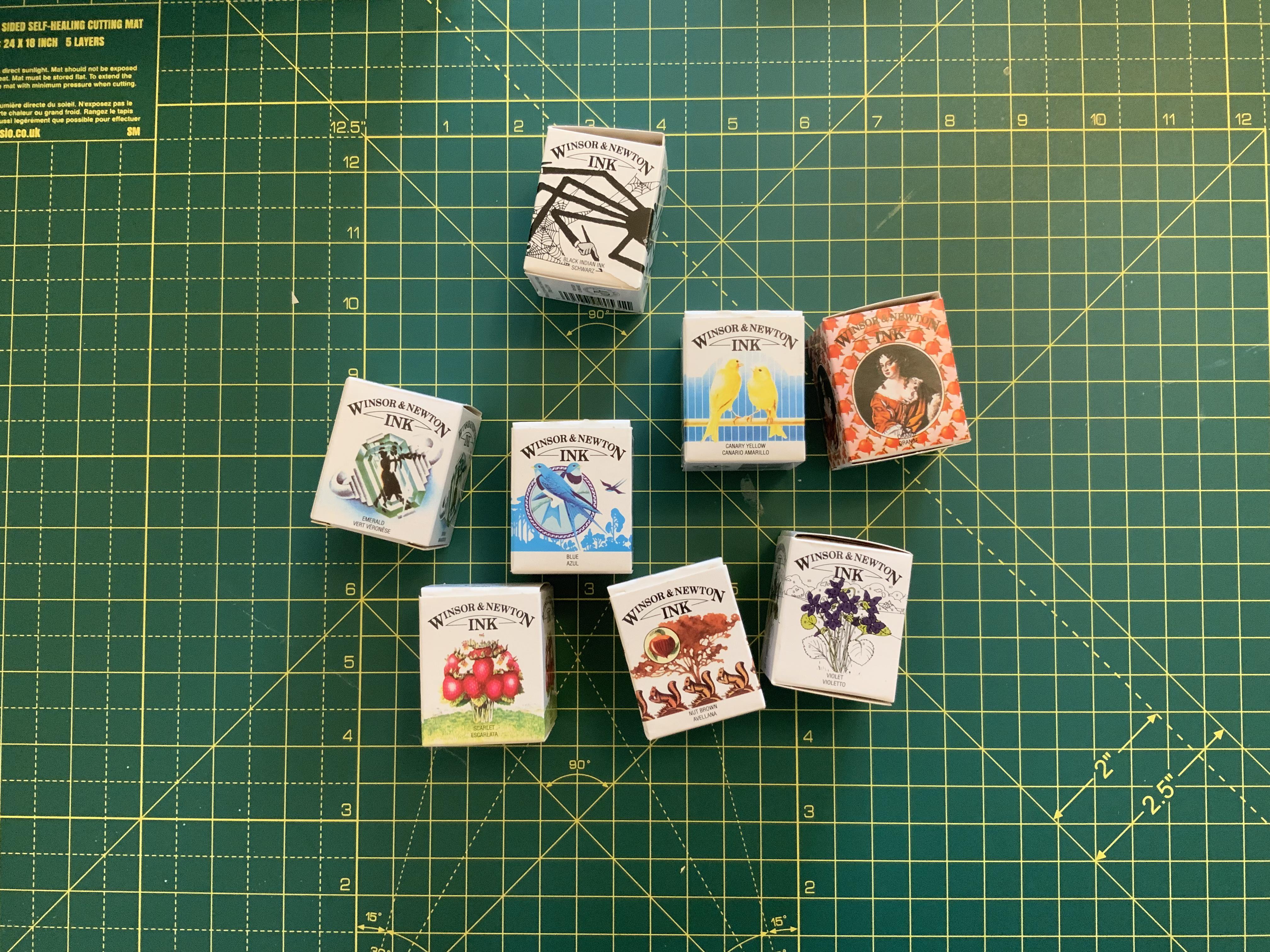 Boxes of Windsor and Newton Inks on a table