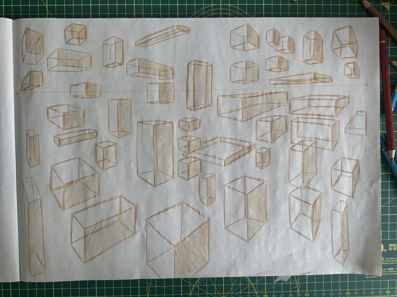 A page of 3D cubes drawn in polychromos pencil