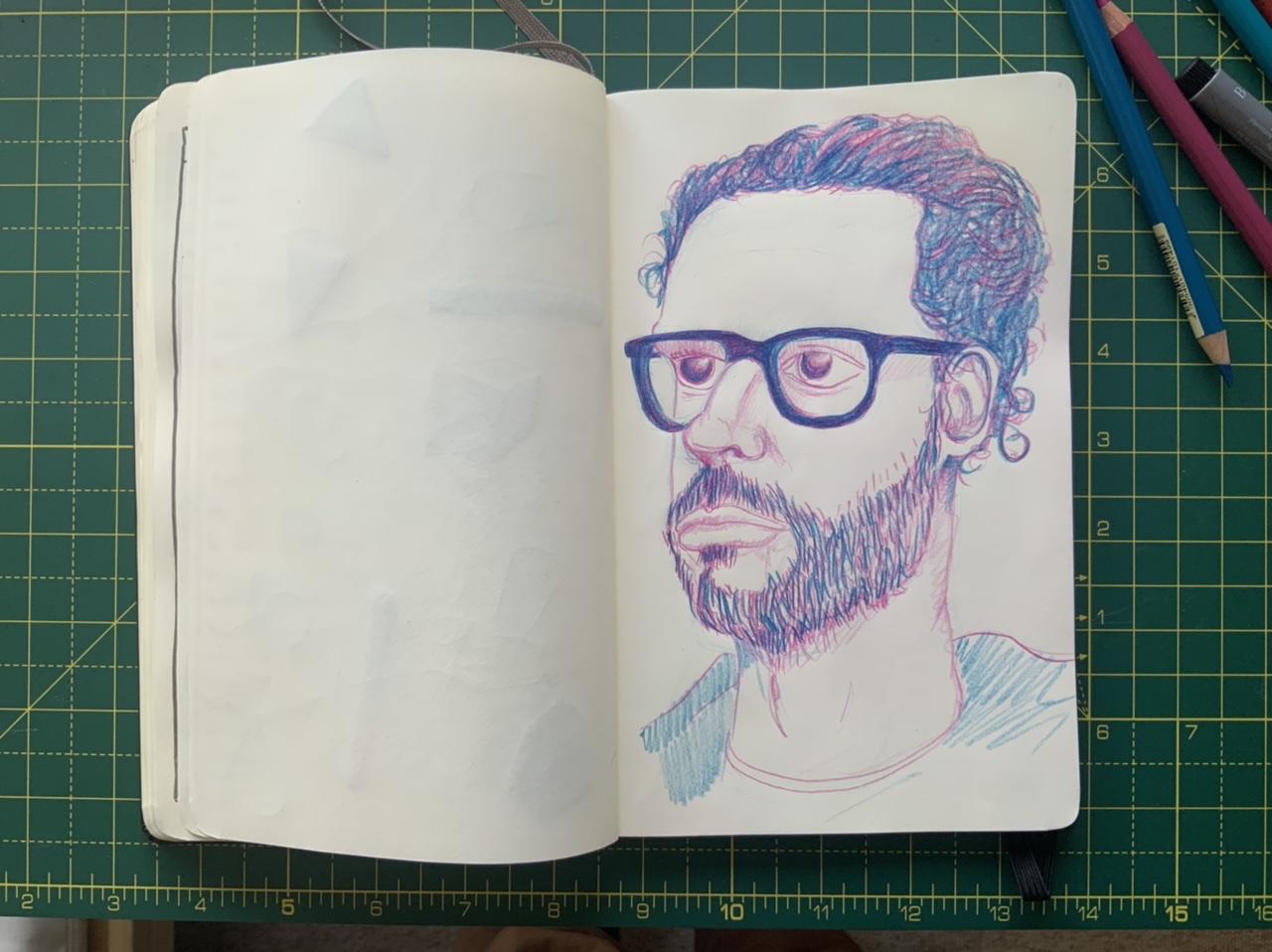 A self portrait in Polychromos pencil by Adam Westbrook