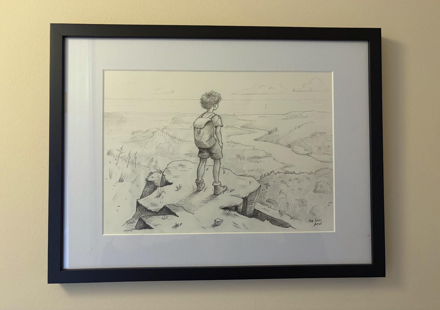 A photograph of my pencil drawing hanging framed on the wall.