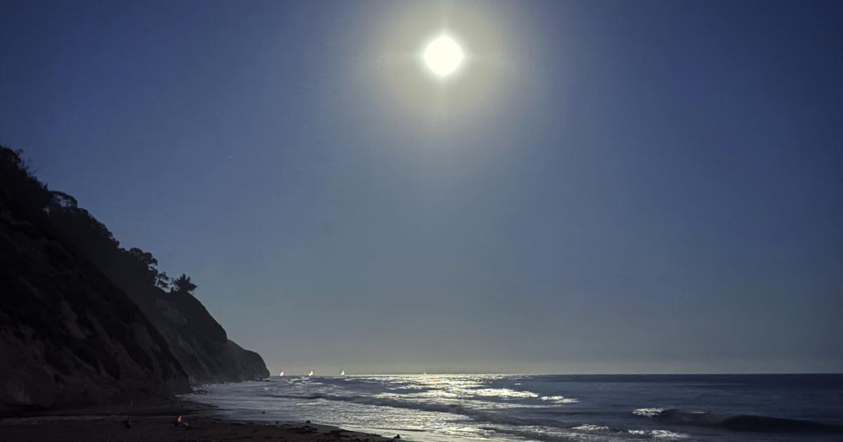 A photograph of the moon rising over the Pacific. Taken by me in Santa Barbara, California.